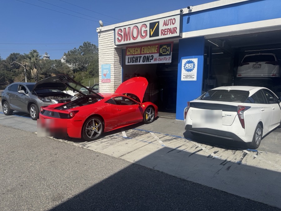 Vehicles in the service bays at Encinitas STAR Smog & Auto Repair, Encinitas